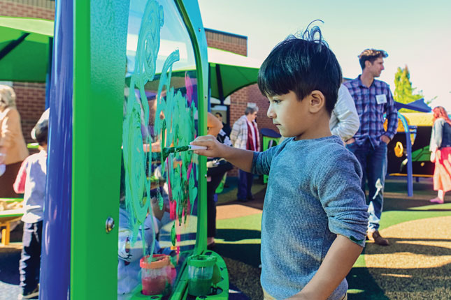 A young boy plays at EDEC's playground.