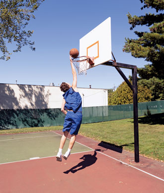 Hayden attempts to dunk a basket.