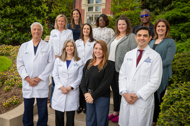 The Pediatric Neurofibromatosis Program team standing outside of Johns Hopkins Hospital,