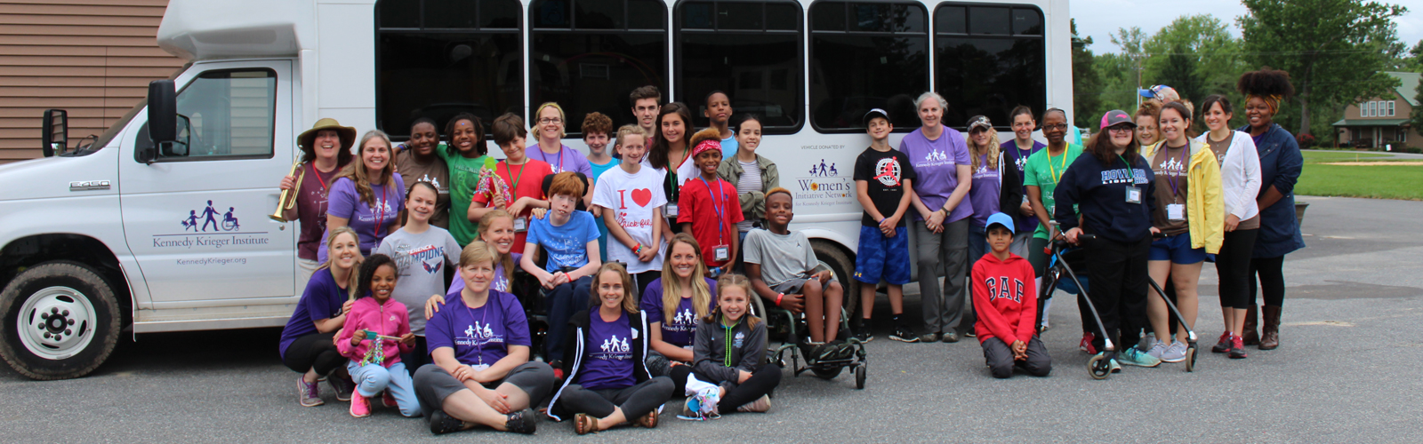 Camp SOAR campers with WIN bus