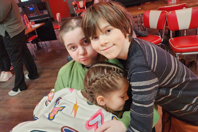 Seamus and two of his siblings.