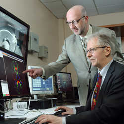 Dr Van Zijl and Pekar viewing a MRI