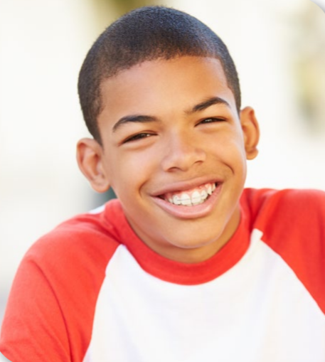 A stock photo of a young boy, smiling
