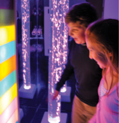  Justin and his sister, Lauren, exploring the multisensory room at the Montgomery County Campus school in 2008.