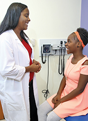 Tashamere meets with her neurologist, Dr. Eboni Lance, medical director of Kennedy Krieger's Sickle Cell Neurovelopmental Clinic.