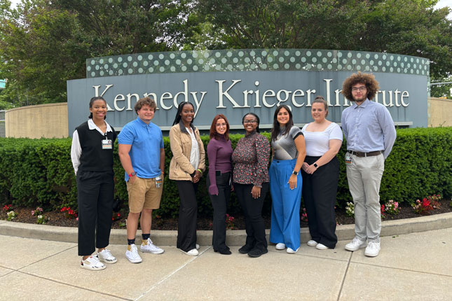 EMURG scholars gather outside of Kennedy Krieger Institute.