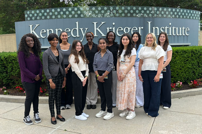 MCH-LEARN scholars gather outside of Kennedy Krieger Institute.