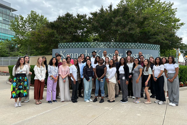 MCHC-/RISE-UP scholars gather for a photo outside of Kennedy Krieger Institute.