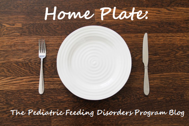 The words "Home Plate: The Pediatric Feeding Disorders Program Blog" appear in white on top of an illustration of a table with a plate, fork, and knife