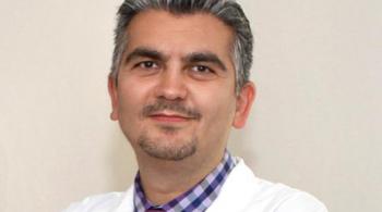 A headshot of Dr. Ali Fatemi