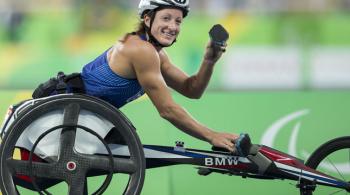 Tatyana McFadden participating in wheelchair racing at the Paralympics. 